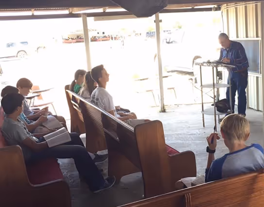 Bible class or worship service at camp